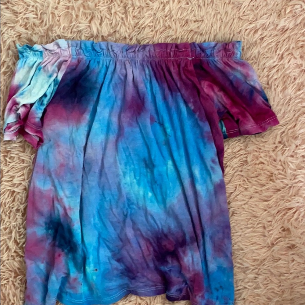 Off the shoulder is tie-dye shirt